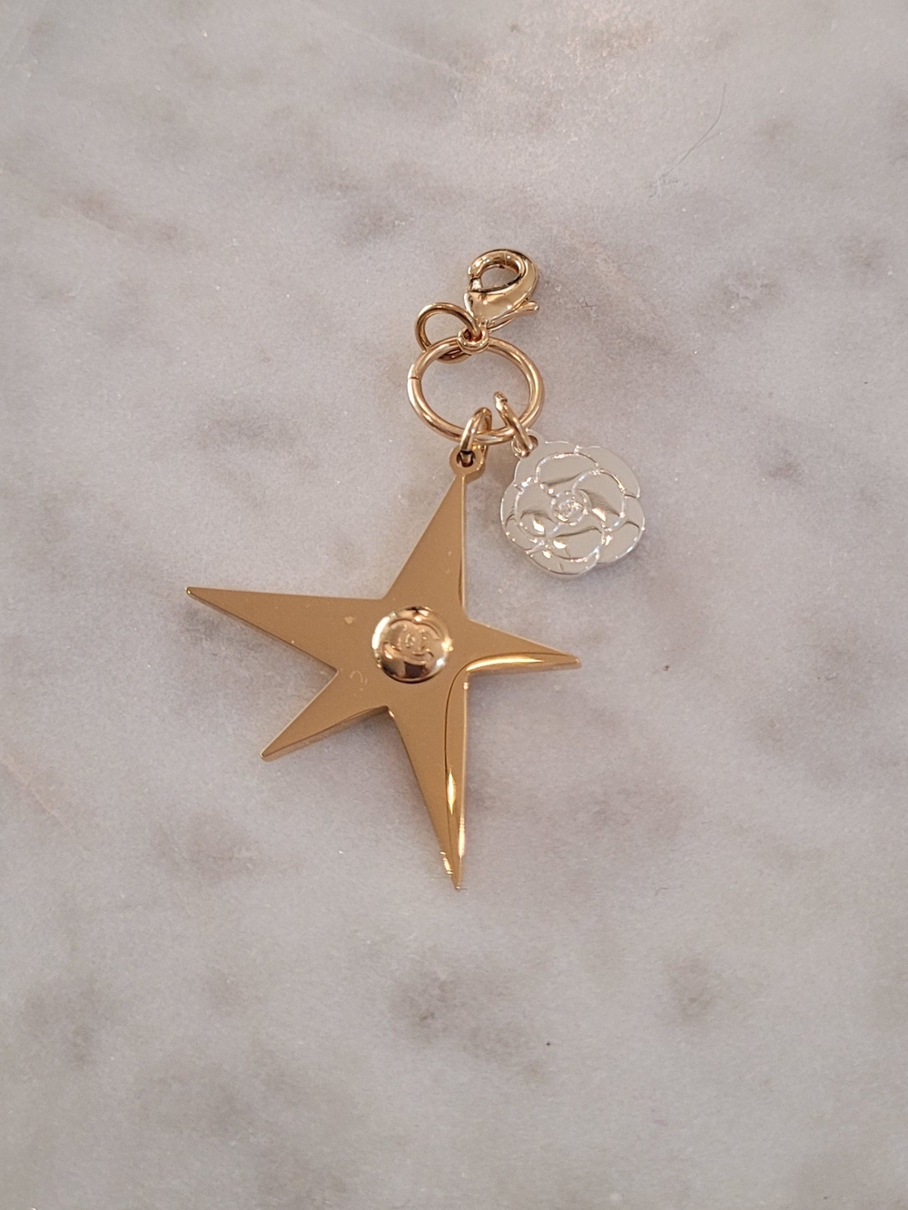 Authenic Chanel 2025 Holiday Gold Star Charm Keyring with Flower Pendant